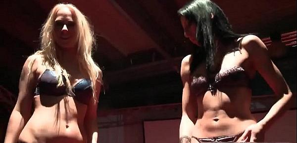  Two horny strippers get on stage to play